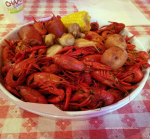 champy's crawfish with potatoes, mushrooms, sausage, and corn